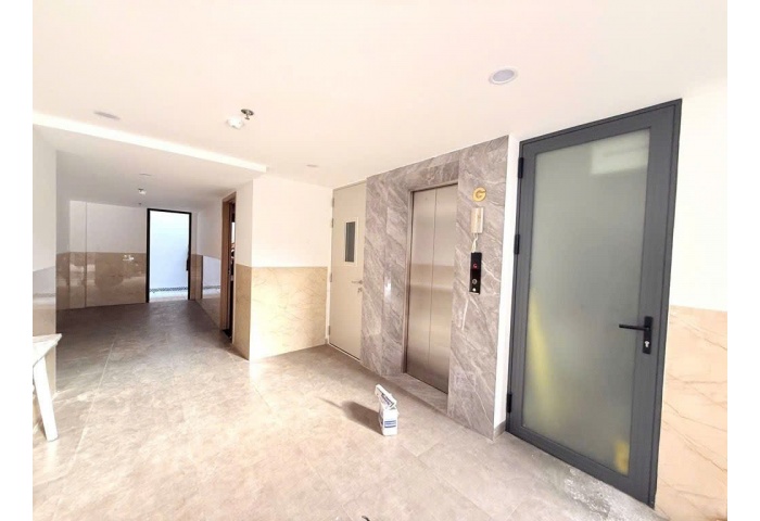 CHDV 100M2, NGUYỄN TƯ GIẢN – 16 PHÒNG, THÁNG MÁY VÌ VU, HẺM 6M, DOANH THU 1.2 TỶ/NĂM